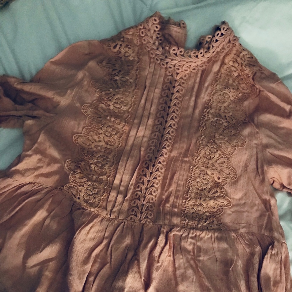 Light pink elegant blouse.